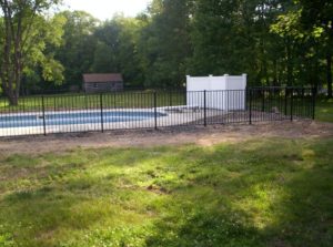 Here, OnGuard Heron Style 48 inch pool fence is installed with an Illusions 5 foot tall T&G privacy vinyl privacy panel to enclose the filter. Vinyl fence around the filter acts as sound deadening so you can enjoy your pool in the peace and quiet you deserve.