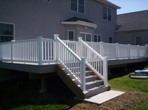 Illusions vinyl deck railings come in any Grand illusions color or Grand Illusions wood grain finish. Your choice of standard 36 inch height or a 42 inch commercial height can be ordered. Offered with 'T' top, 'Flat' top or with a 2x3-1/2 top rail.