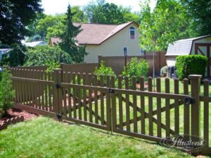 Illusions V350-4TR contemporary spaced picket fence with dog ear cap in Brown L106. Grand Illusions offers single leaf gates up to 6 feet wide.