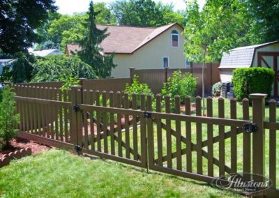 Illusions V350-4TR contemporary spaced picket fence with dog ear cap in Brown L106. Grand Illusions offers single leaf gates up to 6 feet wide.