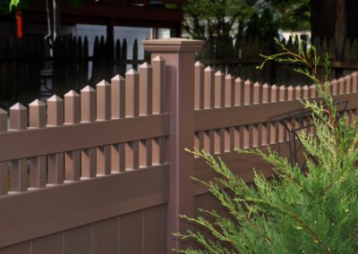 Illusions style V3707 privacy panel with scalloped Victorian picket top in L112 Brownstone. Every Illusions fence style is available in any of the beautiful Grand Illusions colors or wood grain finishes.