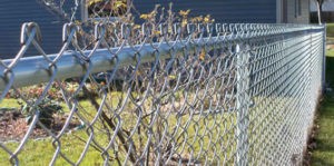 A common misconception is that galvanized chain link mesh (fabric) is less expensive than vinyl coated. It is not because the galvanized product is 9 gauge METAL wheras the vinyl coated is most often an 11.5 gauge aluminized core and the vinyl adds the difference and brings it up to 9 gauge thickness.