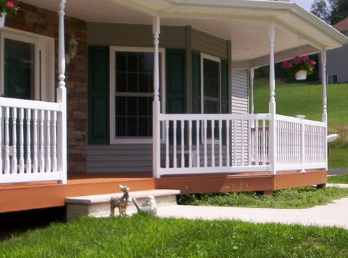 Illusions vinyl deck railing carries an ICC-ES rating as being able to withstand a horizontal impact of 200 lbs.