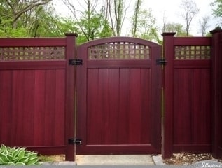 V3215SQ - A T&G privacy panel with square lattice top and a matching crowned gate all in Mahogany wood grain vinyl.