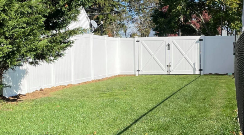 Illusions fence style V300-6 with matching double drive gate shown from inside.