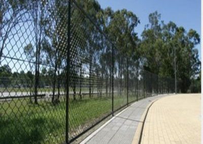 Chain link fence can be fitted with a bottom rail to assure security of pets. A mid rail is often used on tall chain link fence installations.