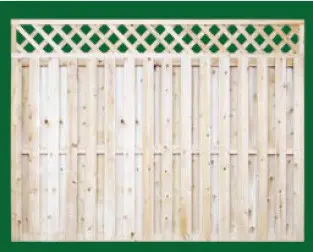 Eastern White Cedar Board On Board Fence with a closed top shown here with a diagonal lattice topper and is available in 4, 5, 6 and 8 foot heights.