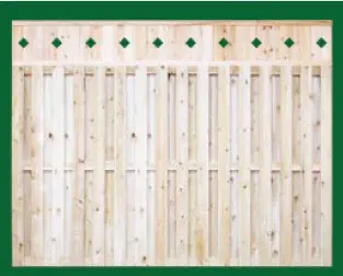 Eastern White Cedar Board On Board Fence with a closed top shown here with a diamond topper and is available in 4, 5, 6 and 8 foot heights.